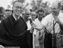 HH Dalai Lama with my father next to him and a journalist